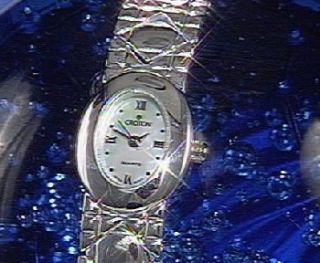 Croton Sterling Silver Oval Case Bracelet Watch —