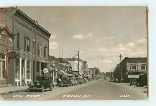 4074 RPPC Crandon, Wisconsin Main Street c1940s Cars Trucks Stores