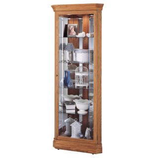  collectibles with pride in this Howard Miller, Hammond Corner Cabinet