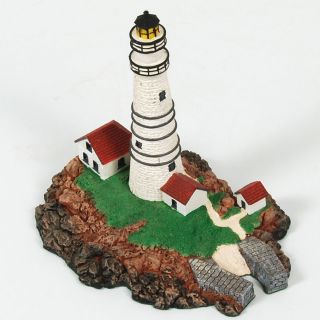 up for auction is this pre owned danbury mint boston light statue in