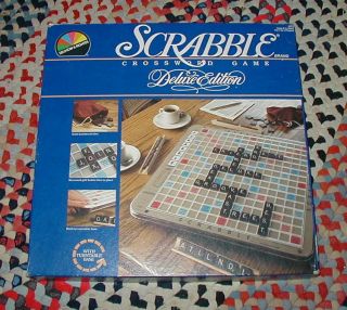Deluxe Scrabble 1987 Edition, rotating game board, mahogany colored