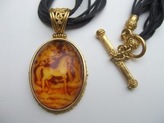 Denise Roberge 22k Gold Leather and Amber Necklace valued at 5 899 00
