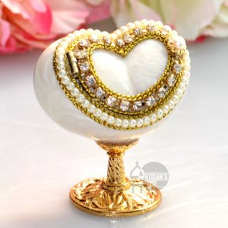 This stunning dove egg decorated by crystals and faux pearls Jewellery
