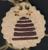 stoneware disc tie on bee skep this stoneware disc is approximately 2