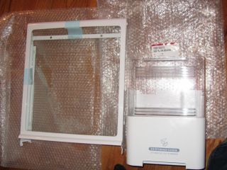 LG Ice Maker bin part number 5075JA1044E and sliding glass shelf