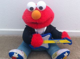 ELMO PLUSH doll ROCK & ROLL electronic with guitar TYCO 1997