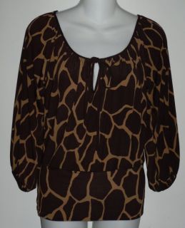 From EVA VARRO this is a fabulous 3/4 length sleeve tunic top in a