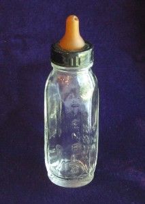 vintage evenflo glass baby doll bottle