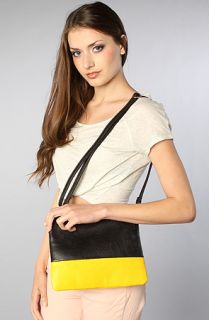 Accessories Boutique The Colorblock Clutch in Black and Mustard