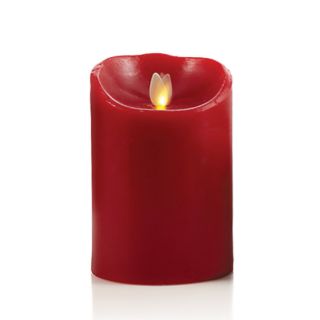 luminara flameless candle red 5 from brookstone with real wax melted