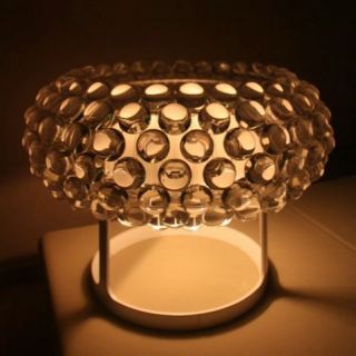 solid design with loads of sparkle the foscarini caboche table lamp