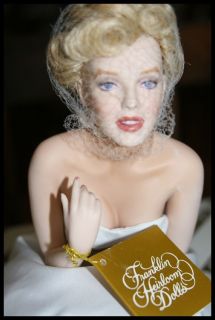from the franklin mint this is a new love marilyn porcelain portrait