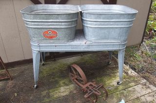 VINTAGE GALVANIZED WHEELING DOUBLE WASH TUBS AND WHEELING WASH STAND