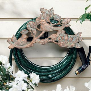 The durable Chickadee Garden Hose Holder will not only look stylish on