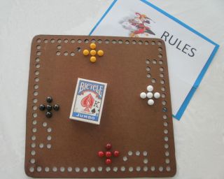 Player Joker Pursuit Cards and Marbles Board Game