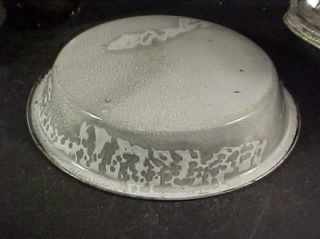 This is a great vintage graniteware gray pie tin. It measures 10 1/2