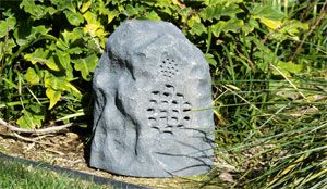  Rock Sounder speaker on your patio, in your garden, or in the grass