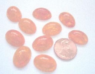 dome lucite cabachons 2 orange faux jelly belly time left