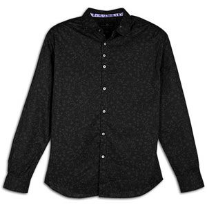 Make your mark in the Marc Ecko Cut & Sew Footprints Woven Shirt. This