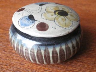 This auction is for this cute little pottery trinket box with lid