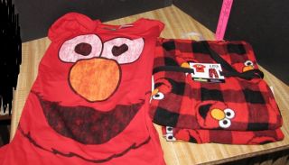 Up for auction is a NEW Sesame Street ELMO Fleece Pajama pants & Top