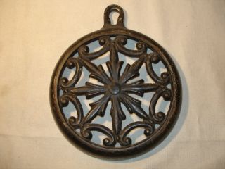 Heavy Antique Trivet Stand Marked on Back Cast Iron