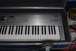 Korg Triton Le Synth Workstation Keyboard 88 Key with Hard Case Stand