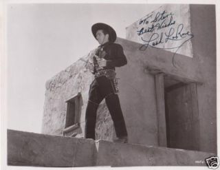 Autographed Lash LaRue in Classic Western Scene