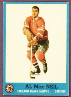 1962 63 Topps Hockey 32 Al MacNeil Black Hawks Card