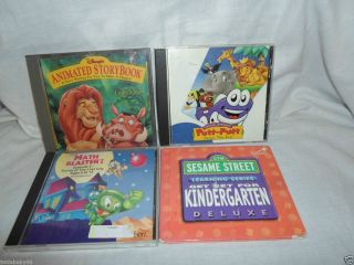 of 4 Childrens CD ROMs Putt Putt Lion King Sesame Street Math Blaster