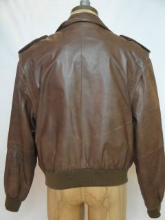 Vintage Members Only leather jacket with zipper front and snap closure