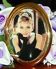 Audrey Hepburn as Holly Golightly Cameo Brooch in Gold