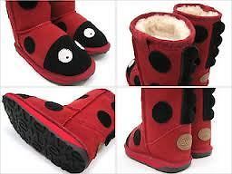 kids fur lined EMU Little creature lady bird boots in red.