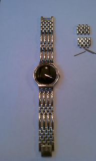 Movado Saphire Crystal Water Resistent Stainless Steel watch Used 84
