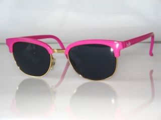 Pink gold comby sunglasses by Bollé in clubmaster style