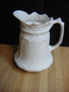 White Ornate Small Porcelain Pitcher   Non Glazed Outside (Bisque