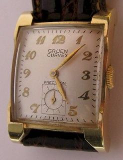 Gruen Curvex 440 17 j. wrist watch in solide 14k gold