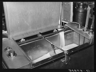 PhotoMilk flowing into pasteurizer. Creamery,San Angelo,Texas