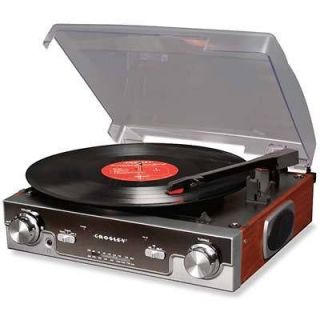 1970s style Crosley Tech Turntable plays vinyl records + AM/FM radio