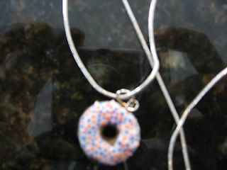 COSTUME JEWELRY SILVER COLORED NECKLACE WITH A DONUT, CUPCAKE + CAKE