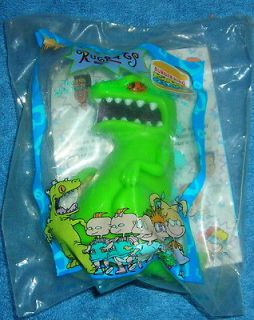 RUGRATS REPTAR THE DINOSAUR 3 PULL BACK ROLLING SPARKING TOY