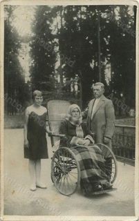 People by old woman in wheelchair antique photo