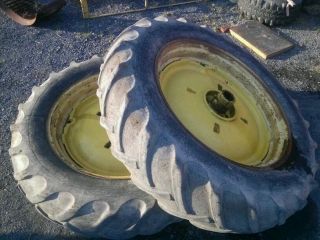 John Deere G Cast Wheels with 14 9x38 Tires