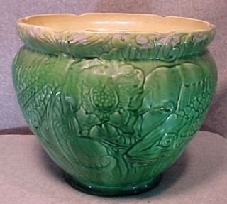 This is a lovely old Roseville art pottery jardinere. A wonderful