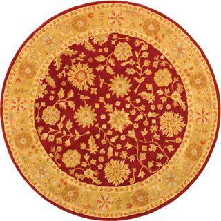 Handmade Heritage Kashan Burgundy/ Beige Wool Rug (6 Round) (RedPattern OrientalMeasures 0.625 inch thickTip We recommend the use of a non skid pad to keep the rug in place on smooth surfaces.All rug sizes are approximate. Due to the difference of monit