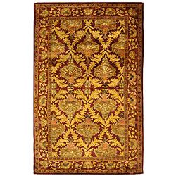 Handmade Kerman Wine/ Gold Wool Rug (5 X 8) (RedPattern OrientalMeasures 0.625 inch thickTip We recommend the use of a non skid pad to keep the rug in place on smooth surfaces.All rug sizes are approximate. Due to the difference of monitor colors, some 
