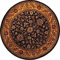 Safavieh Handmade Golden Jaipur Black/ Gold Wool Rug (6 Round) (BlackPattern OrientalMeasures 0.625 inch thickTip We recommend the use of a non skid pad to keep the rug in place on smooth surfaces.All rug sizes are approximate. Due to the difference of 