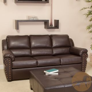 Christopher Knight Home Hadley Brown Leather Sofa (Chocolate brownMinor assembly required; just the legsNeutral colors to match any decorRolled arms and slightly arched backRemovable seats with fixed backsWell padded foam cushionsBrass studded accentsDime
