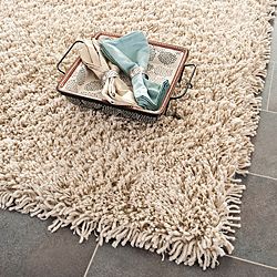 Hand woven Bliss Taupe Shag Rug (2 X 3) (BeigePattern ShagTip We recommend the use of a non skid pad to keep the rug in place on smooth surfaces.All rug sizes are approximate. Due to the difference of monitor colors, some rug colors may vary slightly. O