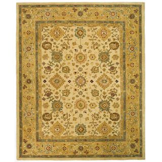 Handmade Heirloom Ivory/ Gold Wool Rug (96 X 136) (IvoryPattern OrientalMeasures 0.625 inch thickTip We recommend the use of a non skid pad to keep the rug in place on smooth surfaces.All rug sizes are approximate. Due to the difference of monitor color